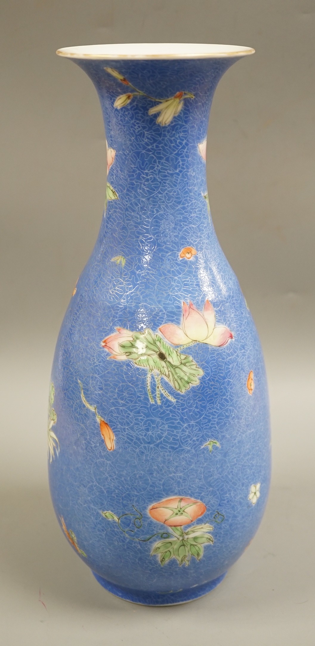 A Chinese sgraffito enamelled porcelain four flowers vase, Qianlong seal mark but Republic period, 35.5cm